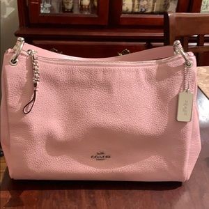Light pink Coach purse.